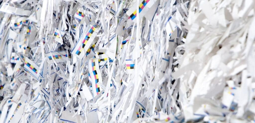 picture of shredded paper that can be used for bedding in horse stalls,