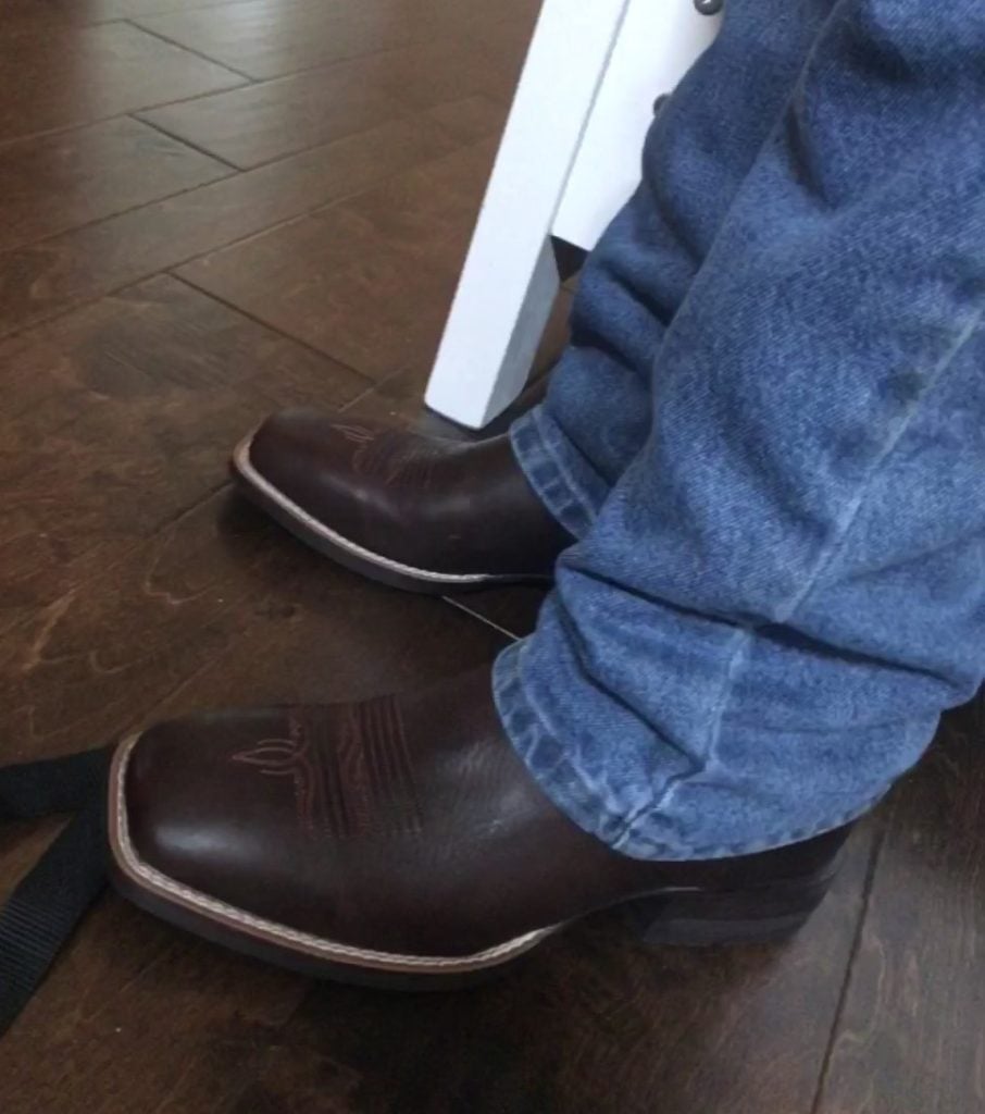 mens cowboy boots on feet