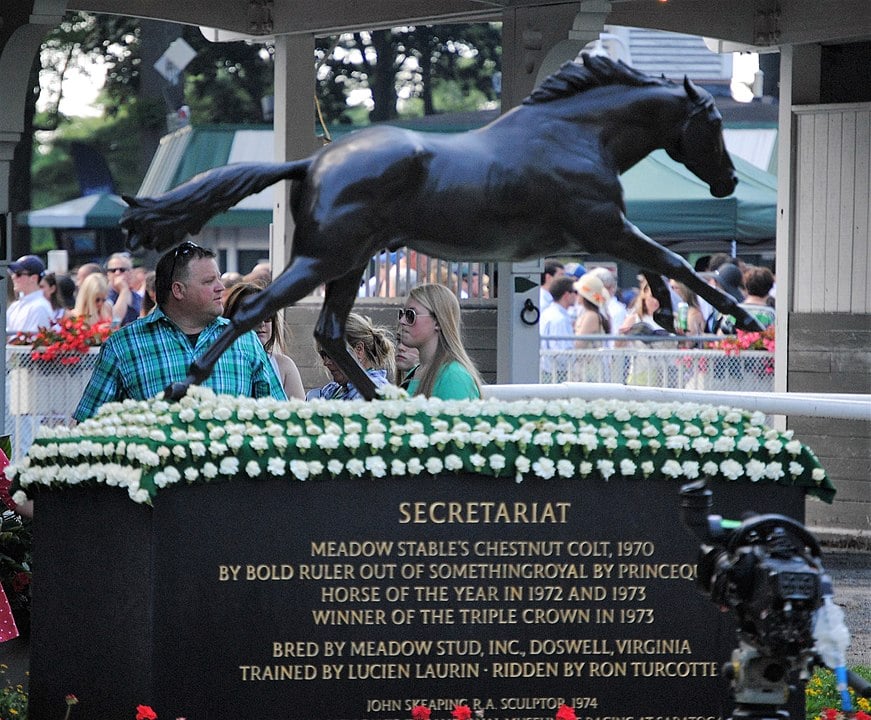 Picture of a statute of Secretariat, in the walking ring at Belmont Park. 