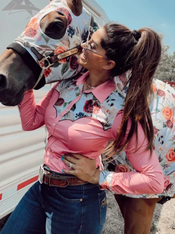 Picture of a woman wearing a rodeo shirt.