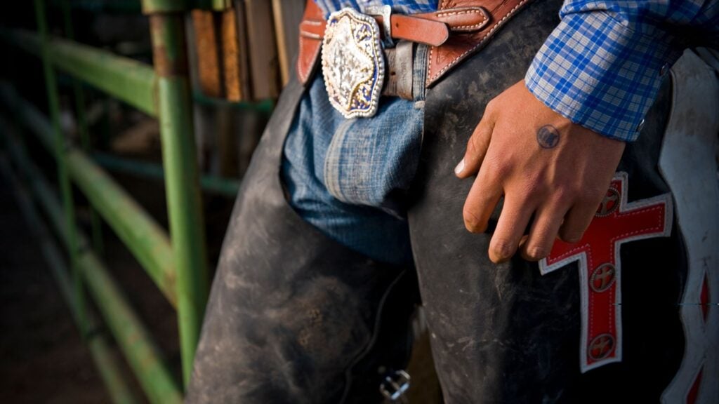 Picture of a cowboy wearing chaps.