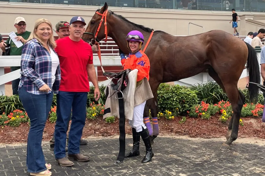 Picture of our horse Ashton after he won a race.  Sonja Bradley and Aubrey Green are also in the picture.  