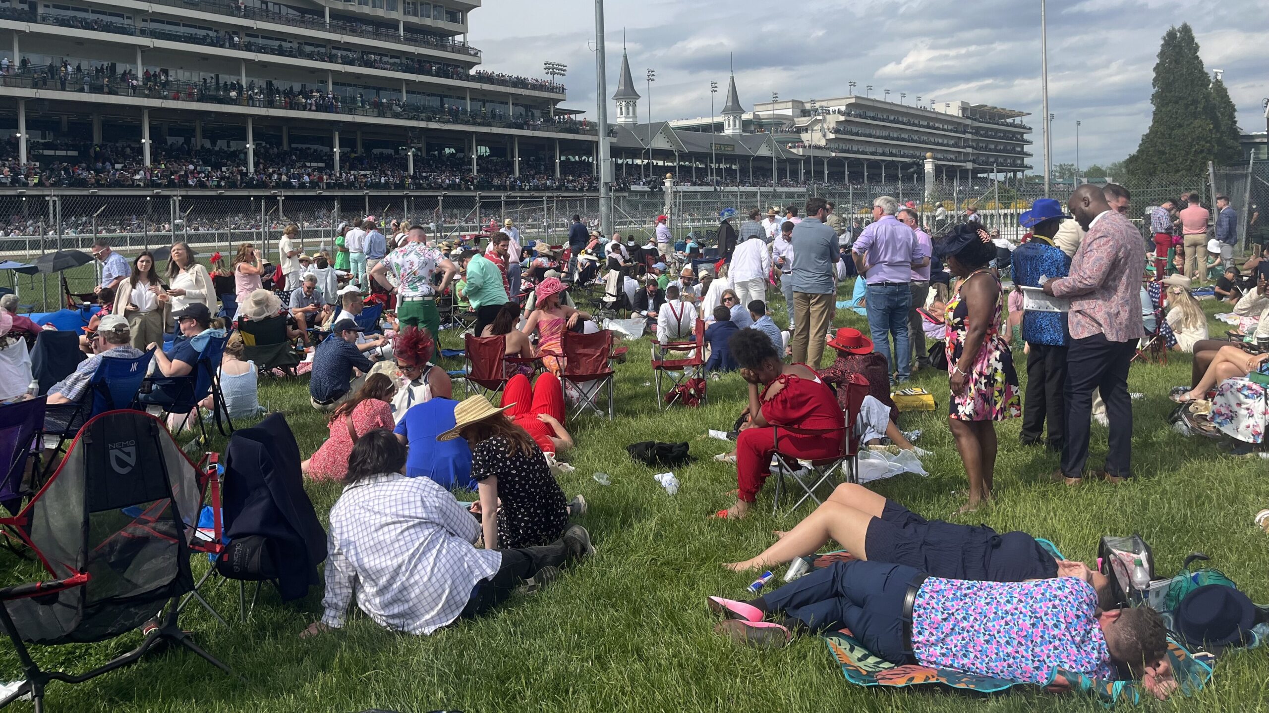 Picture of the laid back crowd at the Kentucky Derby infield. 