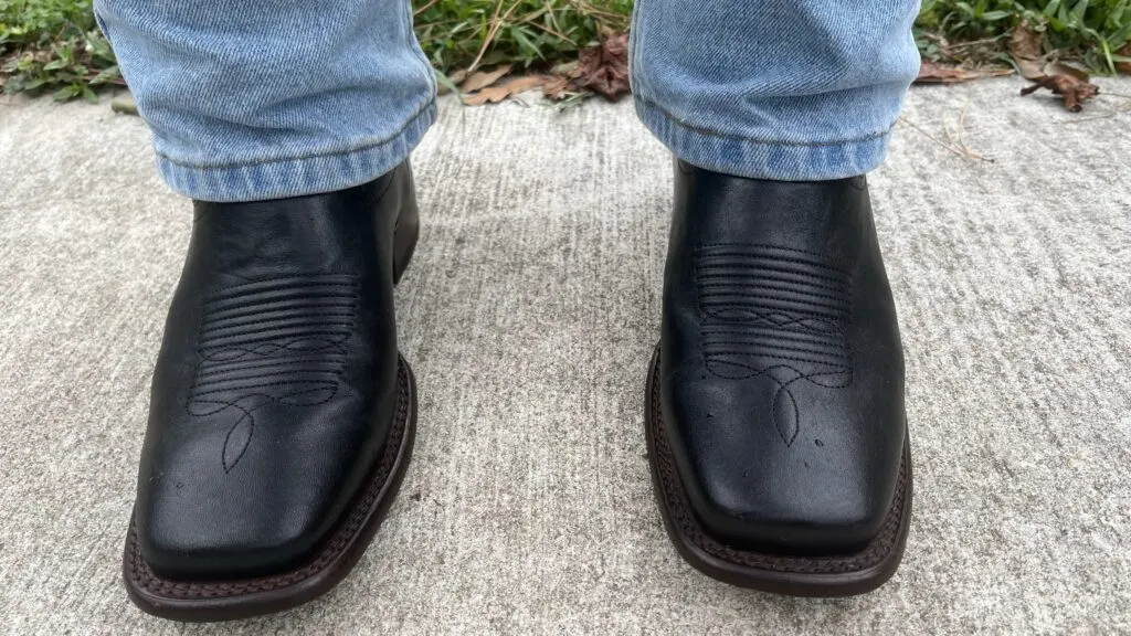 Chisos #2 cowboy boots crafted for durability and style, worn with jeans