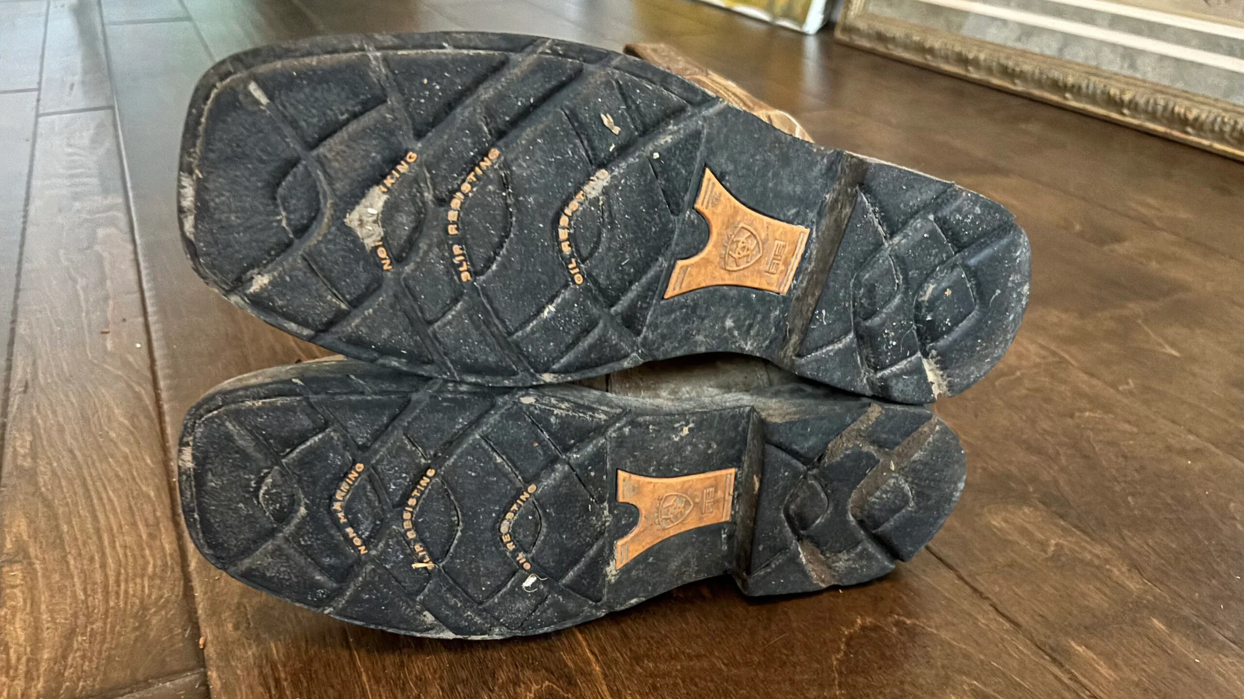 Ariat Sierra Steel Toe Boot with worn Duratread outsole offering traction in barn and field