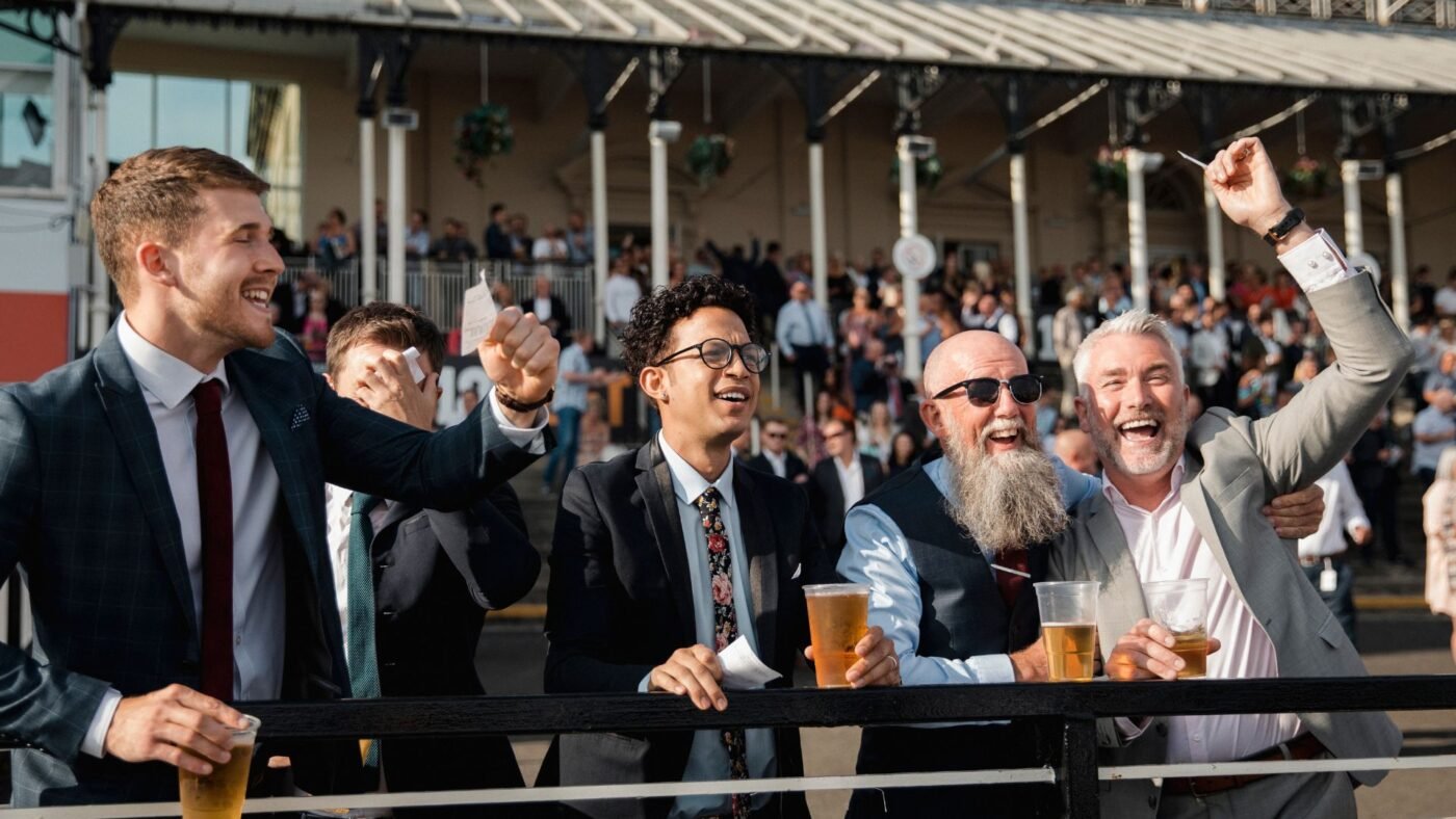 Horse Racing Sense Horse racing crowd cheering at Kentucky Derby