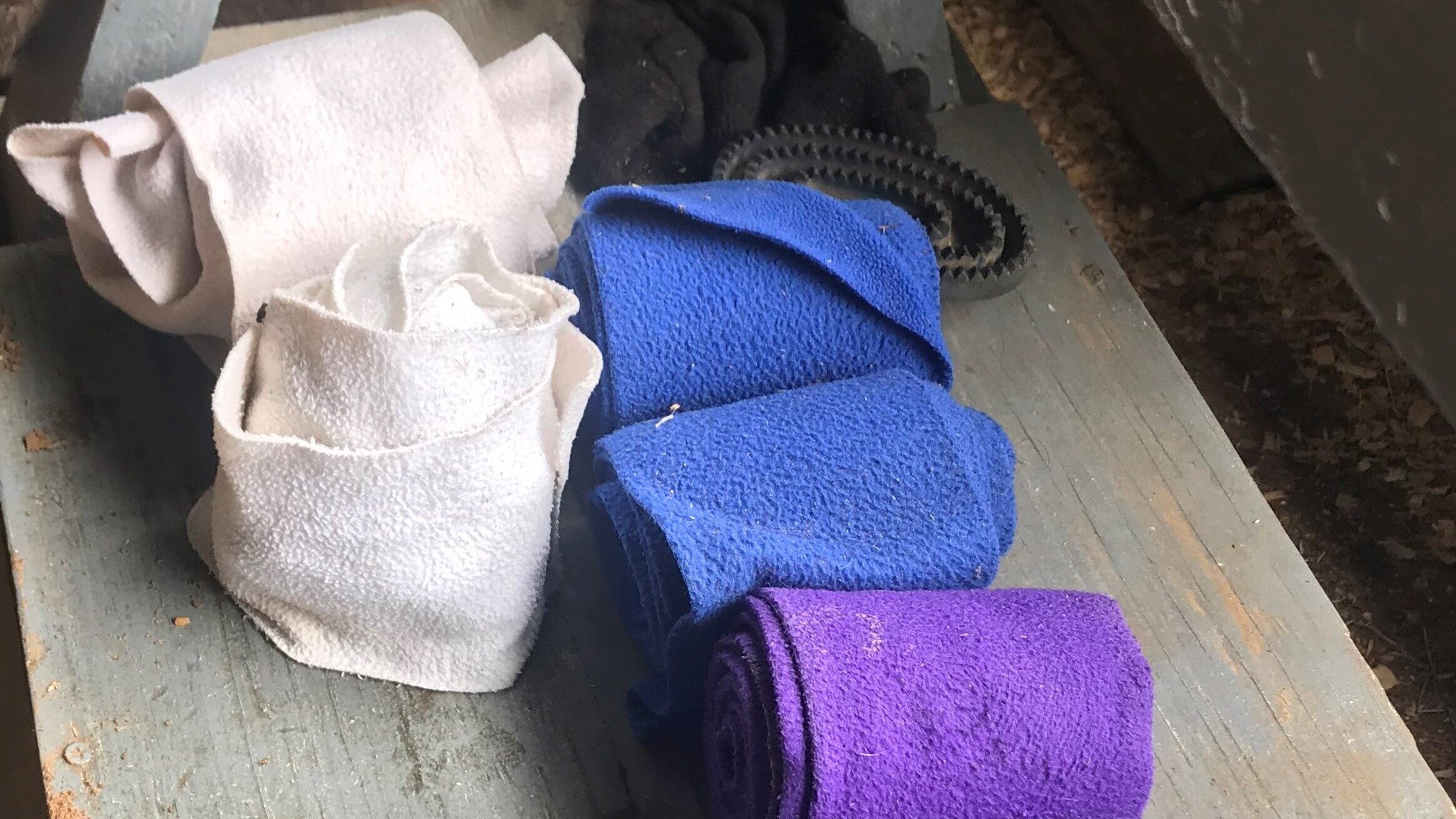Rolled up leg wraps in our tack room. 