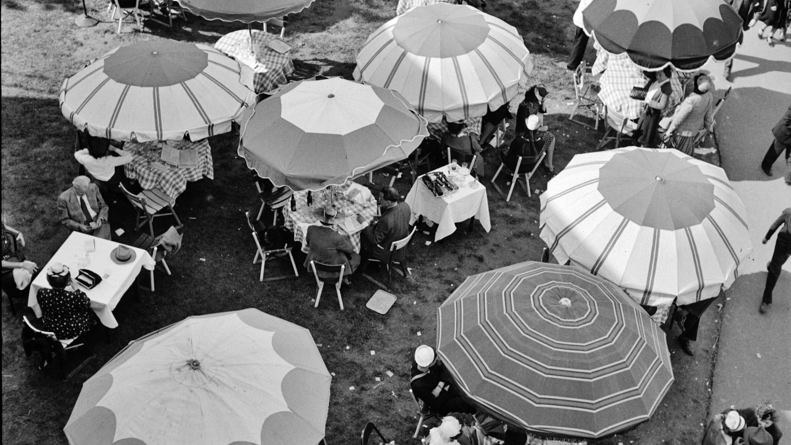 Outdoor dining at Pimlico Race Course near Baltimore, Maryland, on Preakness day in May 1943 &mdash; home of the Preakness Stakes since 1873