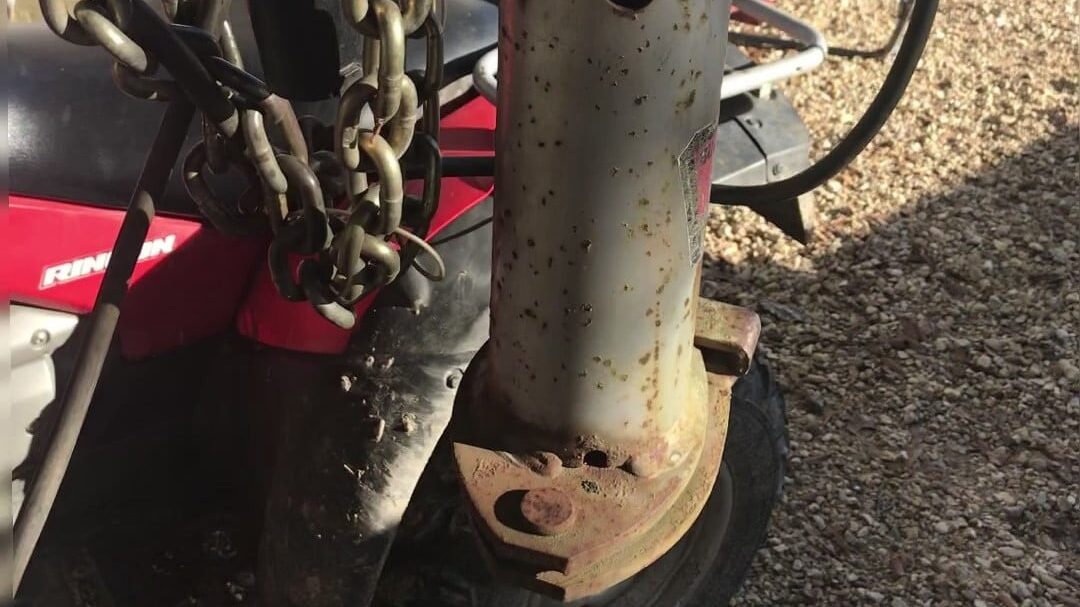 Close up of a gooseneck hitch and pin system. 